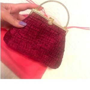 Judith Leiber Burgundy Clutch with Gold Details